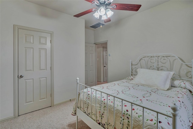 bedroom with a ceiling fan and visible vents