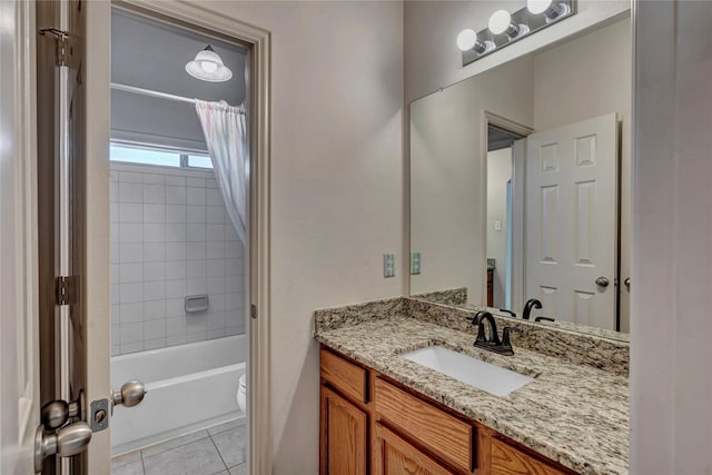 full bathroom with tile patterned flooring, vanity, toilet, and shower / bath combo