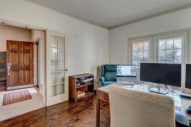 office featuring ornamental molding and wood finished floors