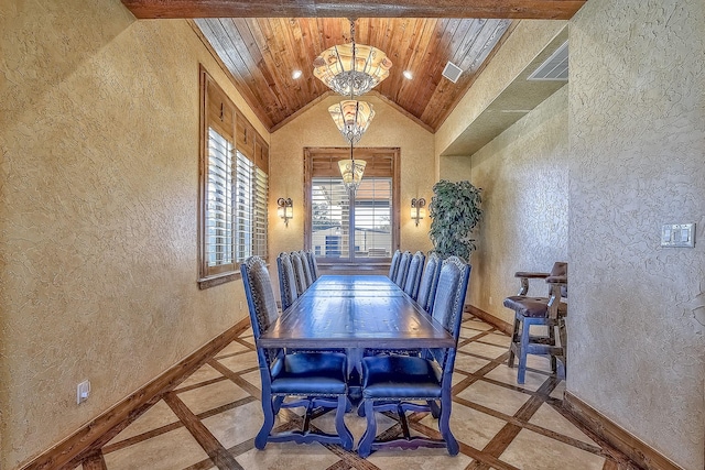 dining space with a textured wall, wooden ceiling, a notable chandelier, and baseboards