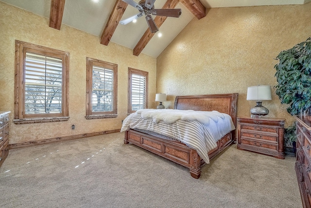 bedroom with baseboards, a ceiling fan, carpet flooring, high vaulted ceiling, and beam ceiling