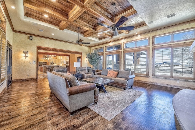 living area with wooden ceiling, hardwood / wood-style flooring, coffered ceiling, visible vents, and crown molding