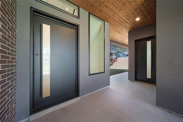 doorway to property featuring a patio area