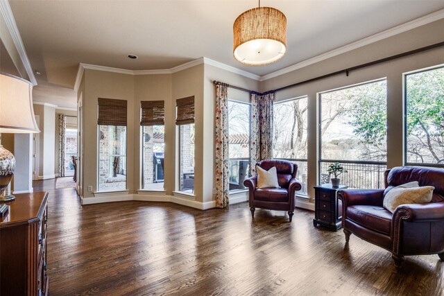 1313 Stoneoak Dr, Mckinney, TX 75072 - sitting room featuring dark wood-style flooring, crown molding, and baseboards