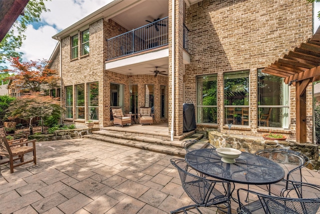 1313 Stoneoak Dr, Mckinney, TX 75072 - view of patio / terrace featuring a balcony, outdoor dining space, and ceiling fan