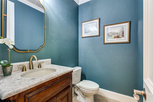 1313 Stoneoak Dr, Mckinney, TX 75072 - bathroom featuring crown molding, tile patterned flooring, toilet, vanity, and baseboards