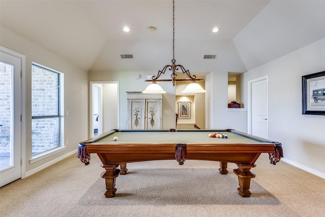 rec room featuring baseboards, visible vents, vaulted ceiling, and light colored carpet