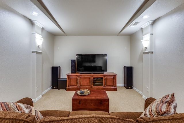 living room with recessed lighting, visible vents, light carpet, and baseboards