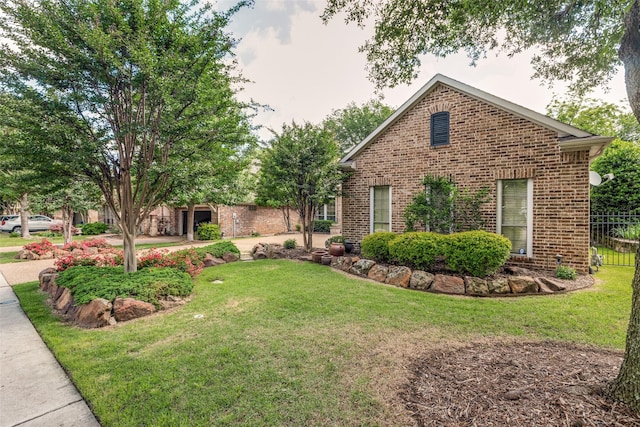 1313 Stoneoak Dr, Mckinney, TX 75072 - view of side of property with brick siding