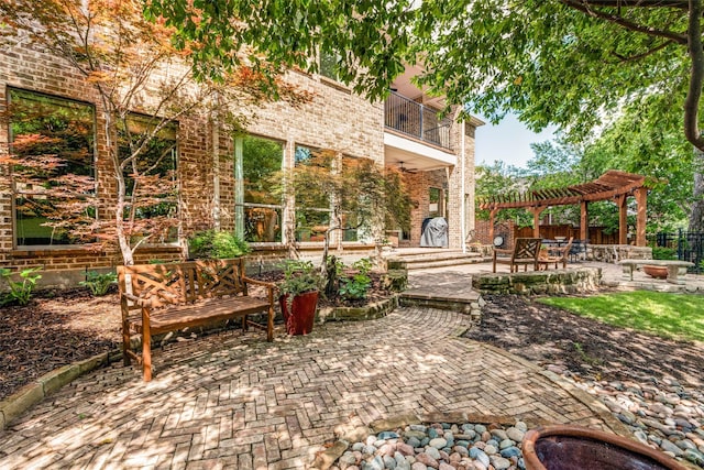 1313 Stoneoak Dr, Mckinney, TX 75072 - view of patio with a balcony, a pergola, and fence