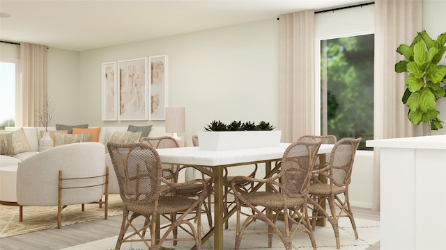 dining space with light wood-style floors