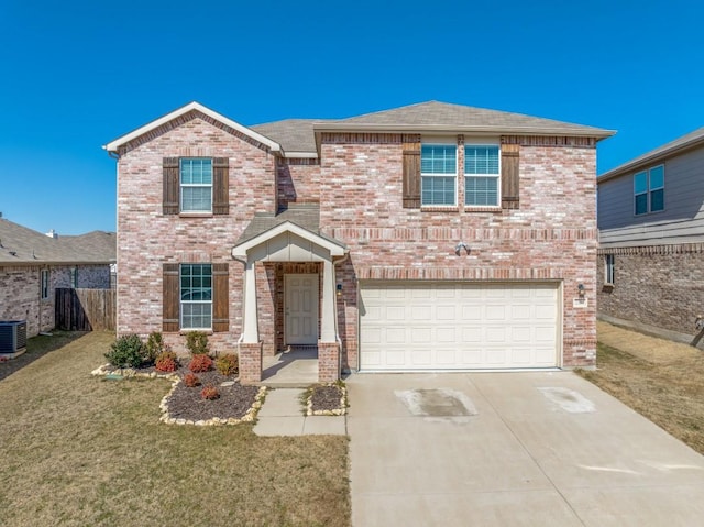 traditional-style home with driveway, an attached garage, a front lawn, and brick siding