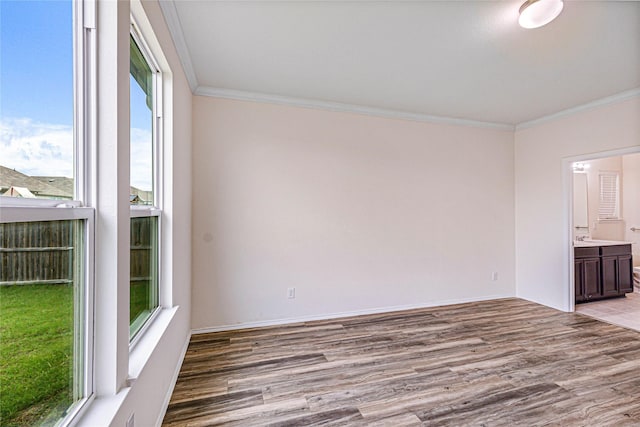 2305 Simmental Rd, Fort Worth, TX 76131 - unfurnished room featuring crown molding, wood finished floors, and baseboards