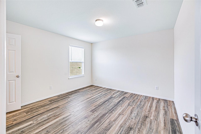 2305 Simmental Rd, Fort Worth, TX 76131 - spare room with wood finished floors and baseboards