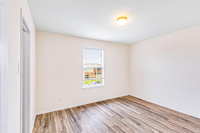 2305 Simmental Rd, Fort Worth, TX 76131 - unfurnished room with wood finished floors and baseboards