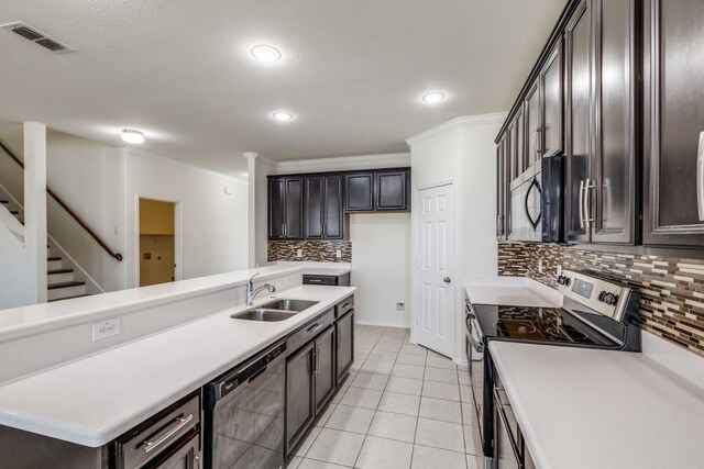2305 Simmental Rd, Fort Worth, TX 76131 - kitchen featuring stainless steel electric range oven, dishwasher, a sink, tasteful backsplash, and light countertops