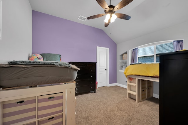 bedroom featuring carpet flooring, a ceiling fan, visible vents, vaulted ceiling, and baseboards