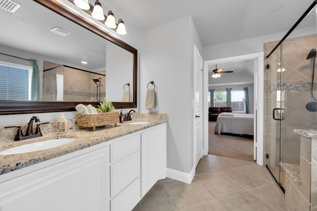 full bath featuring ensuite bath, a sink, visible vents, and a stall shower