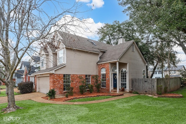 view of front of home featuring a garage, brick siding, a chimney, fence, and a front yard