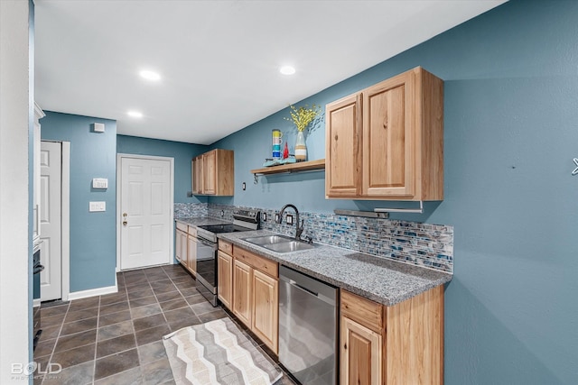 kitchen featuring a sink, baseboards, appliances with stainless steel finishes, open shelves, and tasteful backsplash