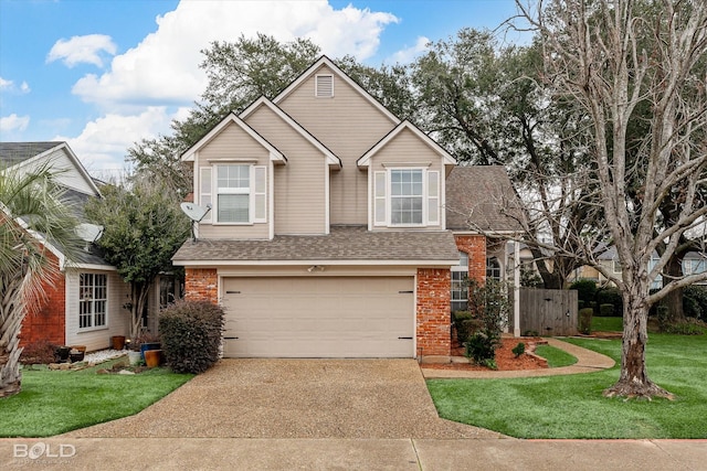 traditional-style home with driveway, brick siding, an attached garage, fence, and a front yard