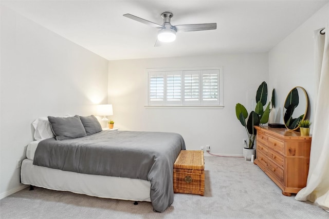 bedroom with carpet, ceiling fan, and baseboards