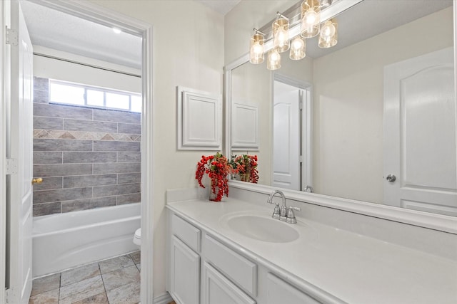 full bathroom featuring vanity and toilet