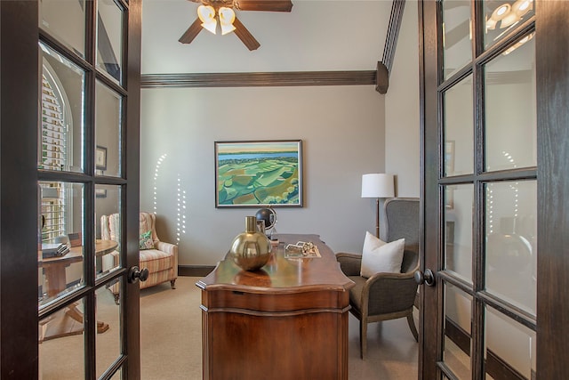 carpeted home office featuring ceiling fan, ornamental molding, and french doors