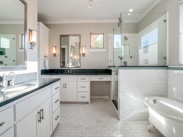 bathroom with ornamental molding, a stall shower, tile patterned flooring, and a sink