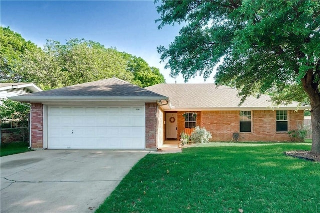 ranch-style home with concrete driveway, a front lawn, an attached garage, and brick siding