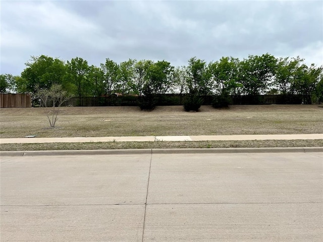 exterior space with curbs and sidewalks