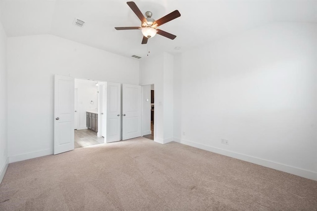 unfurnished bedroom featuring light carpet, visible vents, and baseboards