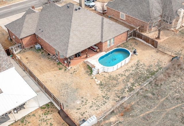 view of pool with a patio area, a fenced backyard, and a fenced in pool