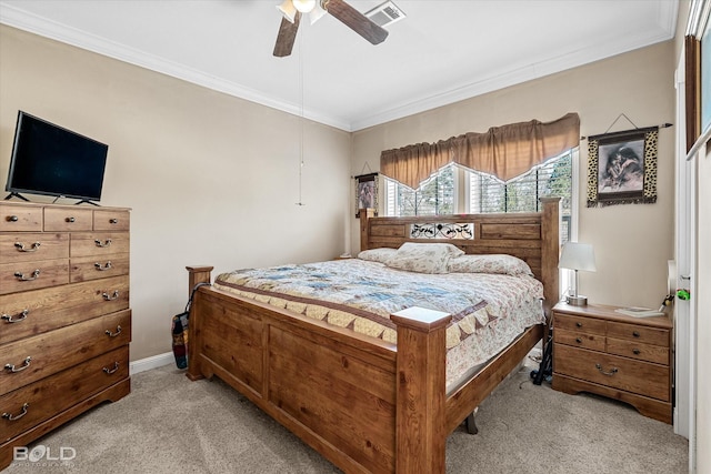 bedroom featuring light carpet, baseboards, visible vents, ceiling fan, and crown molding