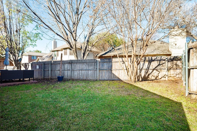 view of yard featuring a fenced backyard