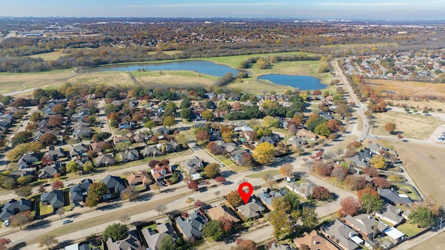 aerial view with a water view and a residential view