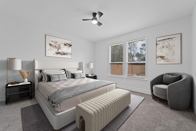 bedroom with carpet, ceiling fan, and baseboards