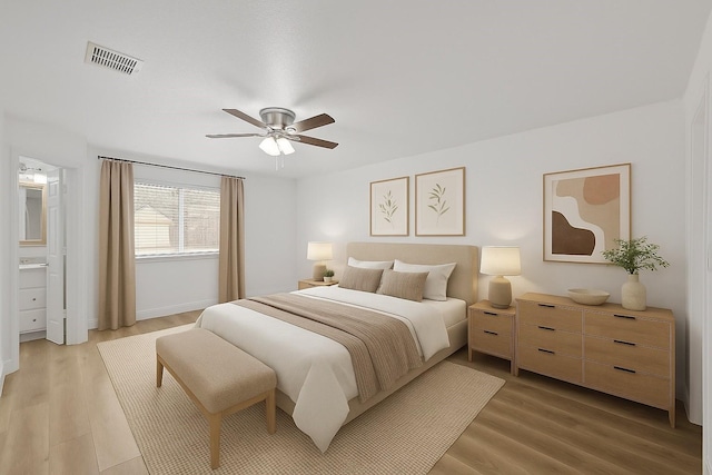 819 Netherland Dr, Arlington, TX 76017 - bedroom featuring light wood finished floors, a ceiling fan, and baseboards