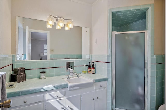 full bathroom with a stall shower and vanity