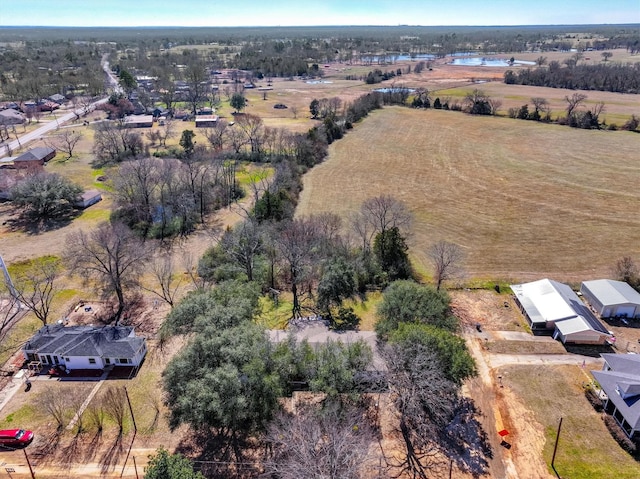 birds eye view of property featuring a rural view