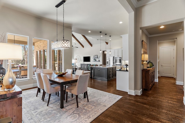 dining room with dark wood-style floors, recessed lighting, crown molding, and baseboards