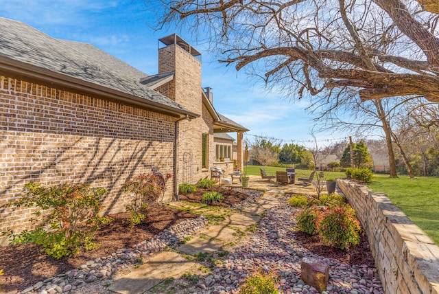 view of yard with a patio area