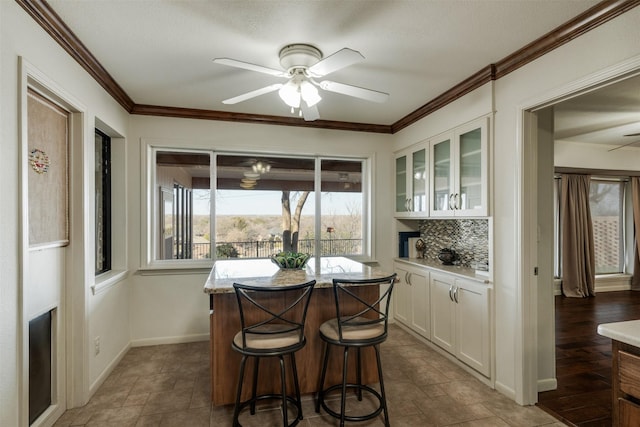 interior space with a ceiling fan