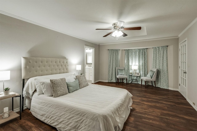 bedroom with a ceiling fan, crown molding, baseboards, and wood finished floors