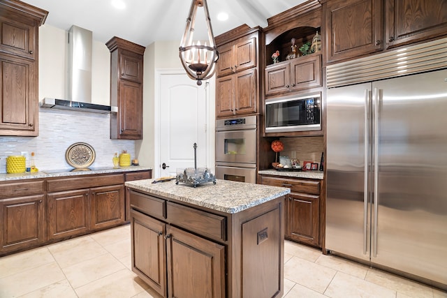 kitchen featuring built in appliances, light stone counters, open shelves, a kitchen island, and wall chimney exhaust hood