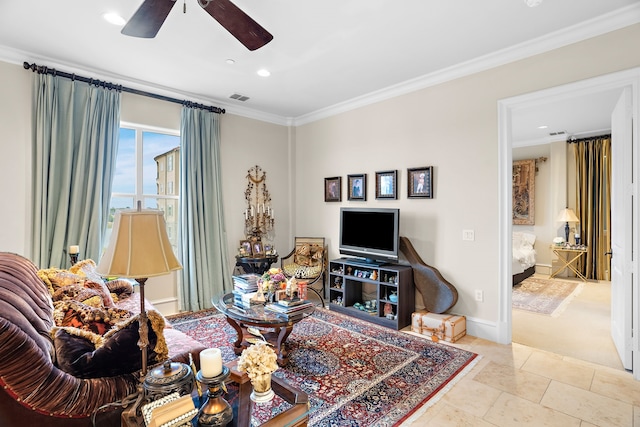 tiled living area featuring baseboards, a ceiling fan, visible vents, and crown molding