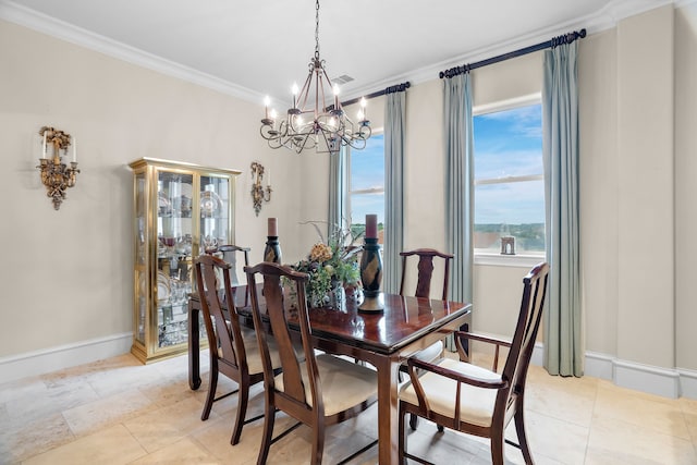 dining space with ornamental molding, a chandelier, visible vents, and baseboards