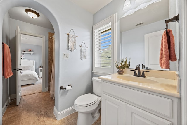 full bath with tile patterned floors, visible vents, toilet, baseboards, and vanity