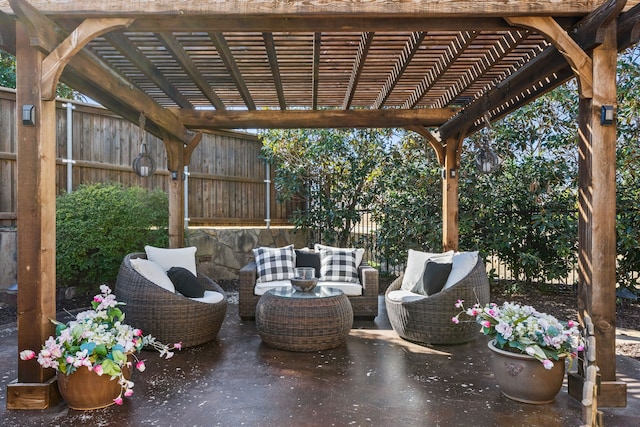 view of patio featuring outdoor lounge area, fence, and a pergola