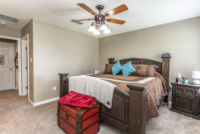 2317 Jodi Ln, Gainesville, TX 76240 - bedroom featuring light colored carpet, a ceiling fan, and baseboards